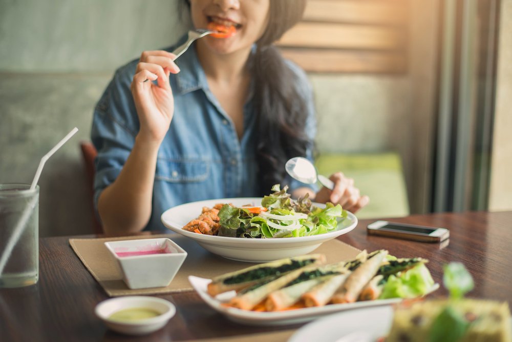 woman eating healthy salad