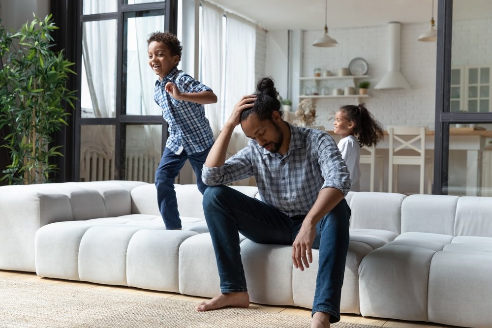 kids running around tired dad