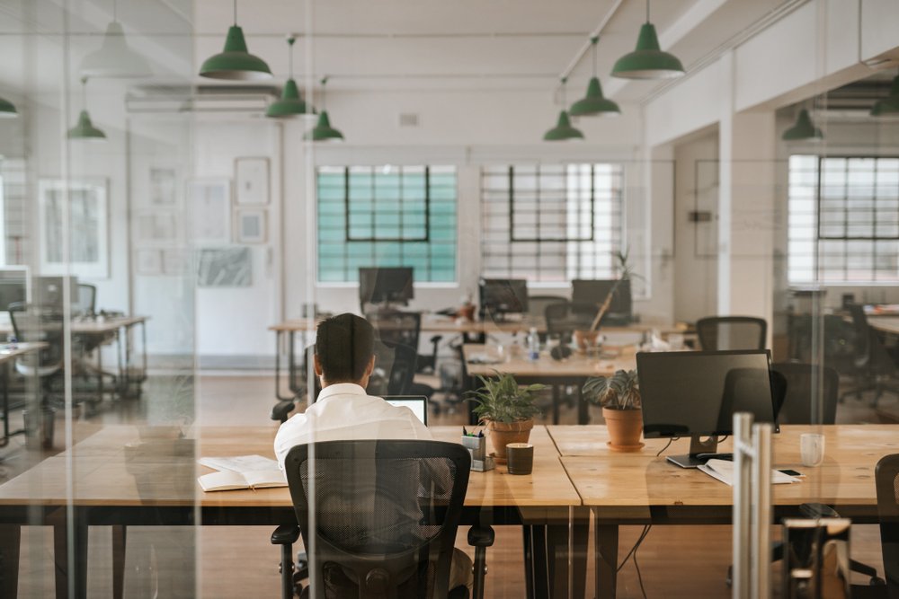 businessman sitting alone at his desk