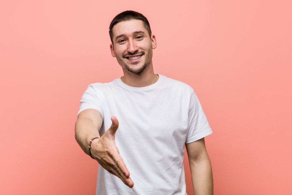 man stretching hand