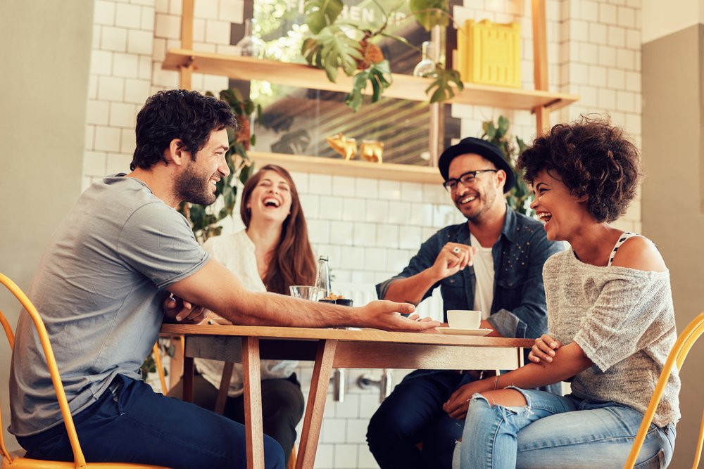 friends having a great time in restaurant