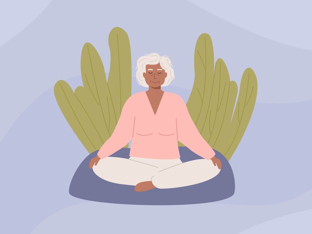 person sitting outdoor at park and practicing yoga or meditation