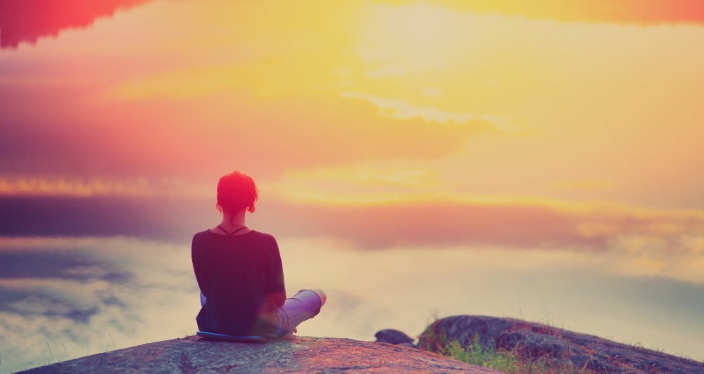 woman sitting enjoying peaceful moment