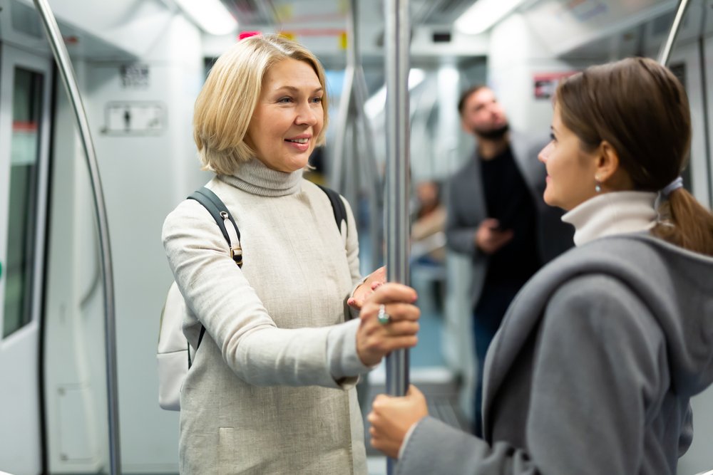 talking friendly with her fellow traveler