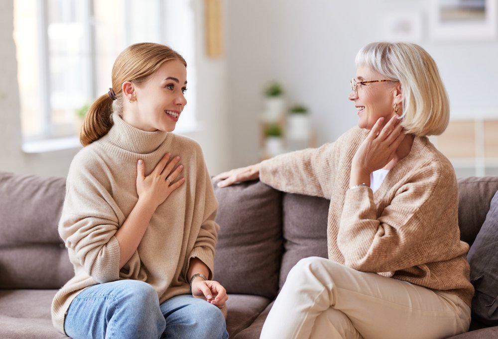 woman smiling and talking